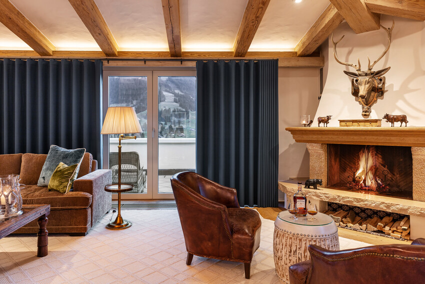 Beautiful living room with Silent Gliss electric curtains